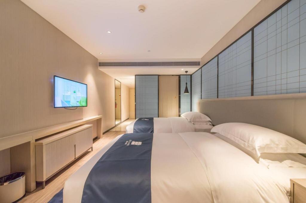 Echarm Hotel Yangjiang Baili Plaza Exterior photo