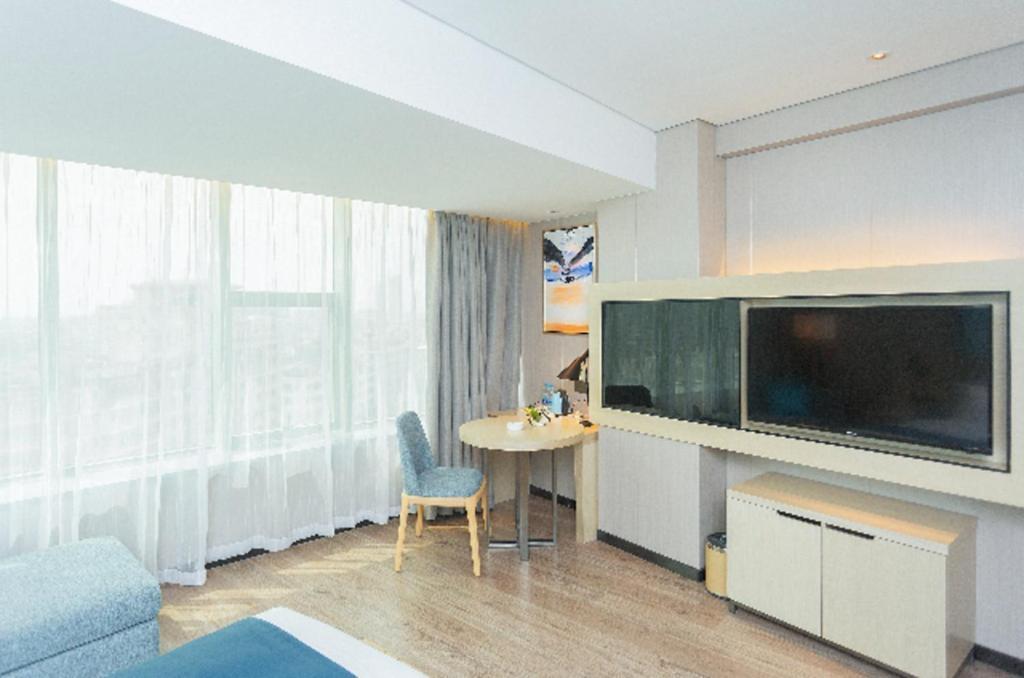 Echarm Hotel Yangjiang Baili Plaza Exterior photo
