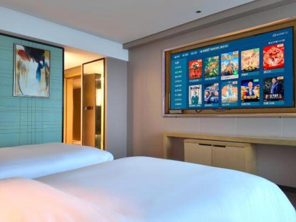 Echarm Hotel Yangjiang Baili Plaza Exterior photo