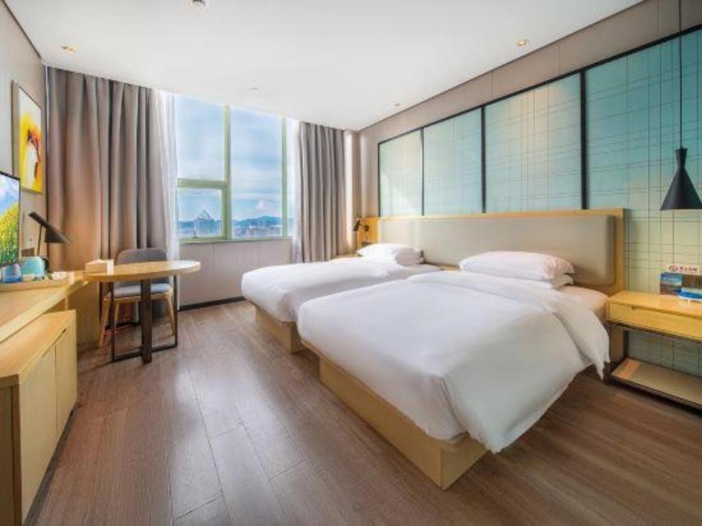 Echarm Hotel Yangjiang Baili Plaza Exterior photo