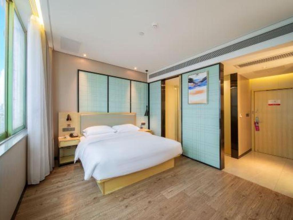 Echarm Hotel Yangjiang Baili Plaza Exterior photo