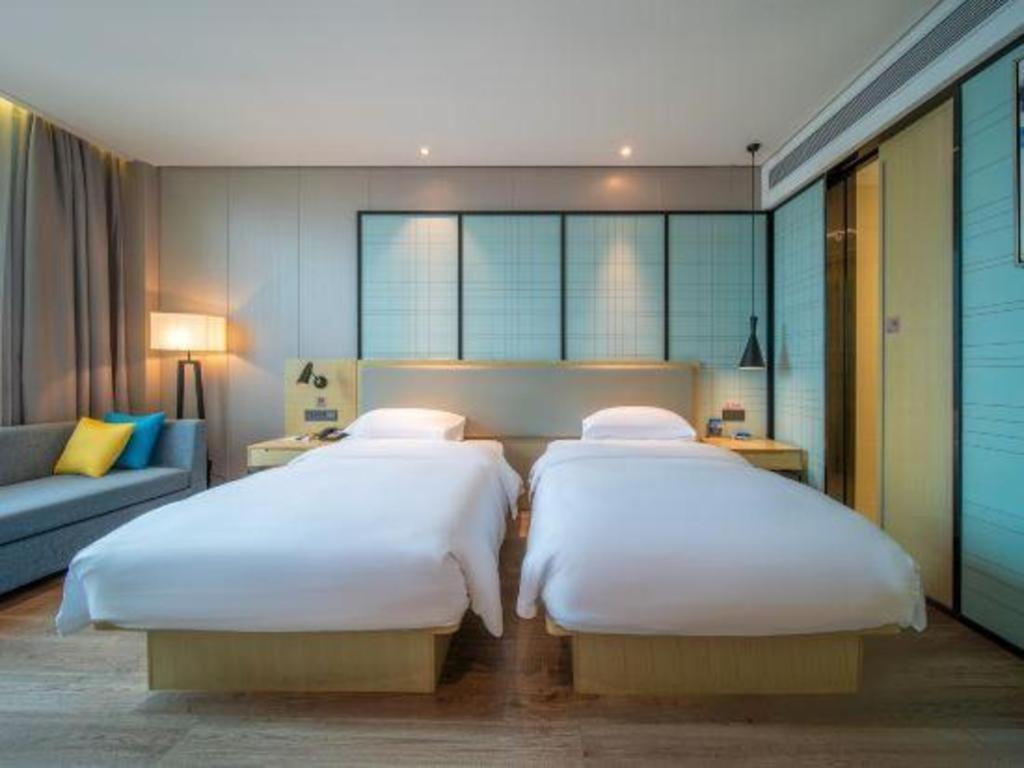 Echarm Hotel Yangjiang Baili Plaza Exterior photo