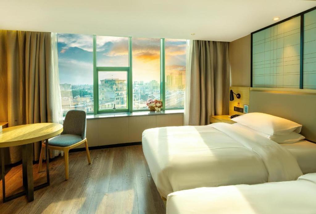 Echarm Hotel Yangjiang Baili Plaza Exterior photo