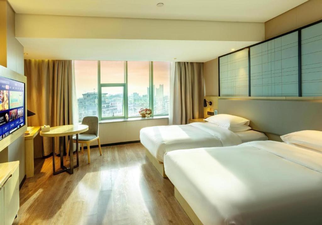 Echarm Hotel Yangjiang Baili Plaza Exterior photo